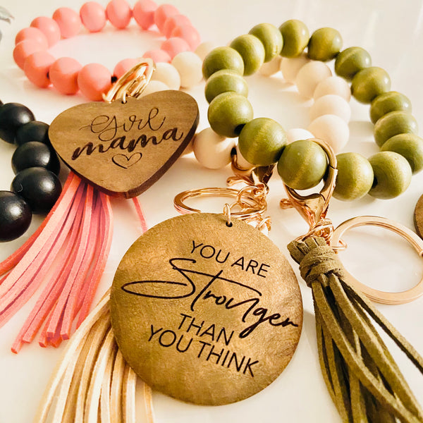 Wooden beads bracelets with engraved charm and tassel